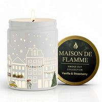 Thumbnail for Maison de Flamme Vanilla & Strawberry light-up scented candle in white jar with winter village artwork and gold lid – Smoke-Out Collection, available at Shopeezy.