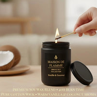 Thumbnail for Hand lighting the black Maison De Flamme Vanilla & Coconut candle — warm cozy vanilla coconut home fragrance.