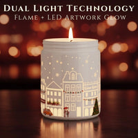 Thumbnail for Dual Light Technology showing real flame and LED artwork glow on Apple & Cinnamon candle – illuminated winter village design, available at Shopeezy.