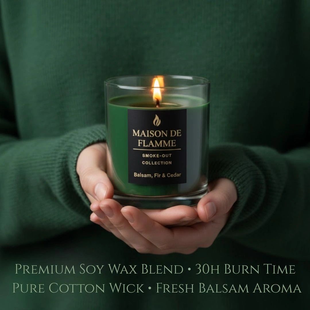 Balsam, Fir & Cedar candle held in cozy hands with green sweater, fresh woodsy forest aroma mood.