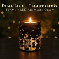 Thumbnail for Dual Light Technology showing real flame and LED artwork glow on Sandalwood candle – illuminated winter village design, available at Shopeezy. Black Jar.