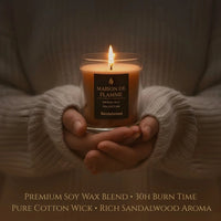 Thumbnail for Cozy Sandalwood scented candle held in hands — warm, relaxing, long-lasting burn.