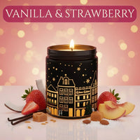 Thumbnail for Vanilla & Strawberry candle in a black jar glowing with strawberries, vanilla cream, and dessert elements in a warm festive setting, available at Shopeezy.