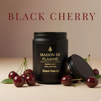 Thumbnail for Black Cherry candle surrounded by cherries, cinnamon sticks, and warm spices — rich cherry spice fragrance notes.