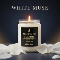 Thumbnail for Maison de Flamme White Musk candle with white petals on a dark background