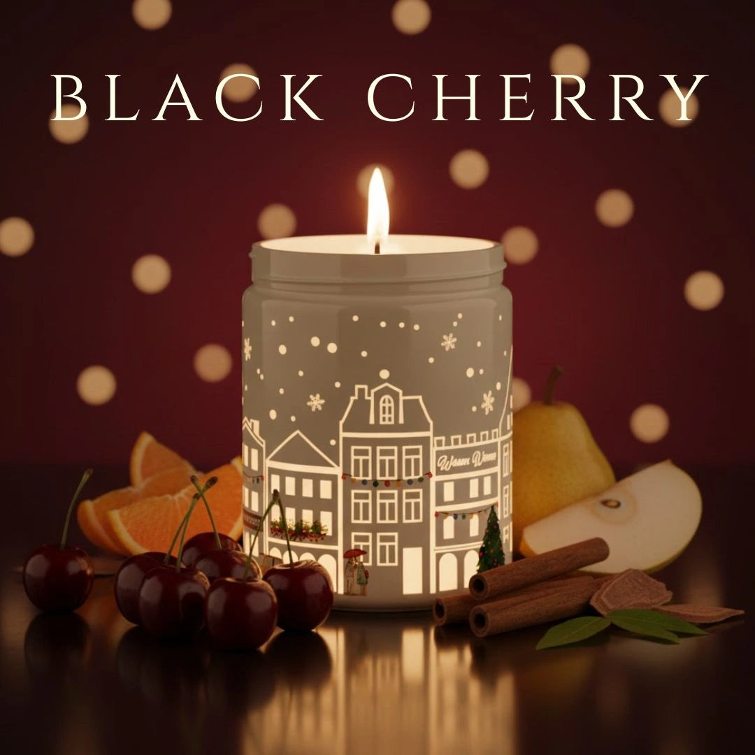 Black Cherry scented candle glowing with cherries, pears, and cinnamon props – warm fruity holiday aroma, available at Shopeezy.