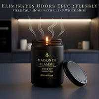 Thumbnail for Maison De Flamme White Musk candle in black jar styled on a navy background — minimalist clean musk scented candle.