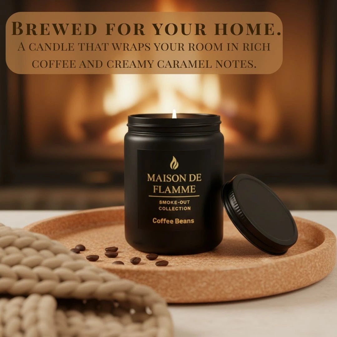 Black Coffee Beans scented candle next to a fireplace — cozy roasted coffee and caramel soy wax candle.