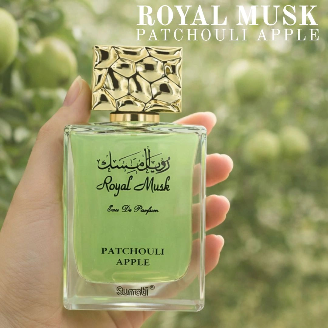 Royal Musk Patchouli Apple perfume by Surrati held in hand outdoors, fresh green unisex Arabian fragrance - Shopeezy