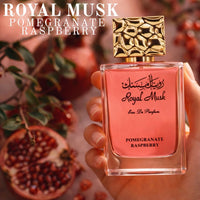 Thumbnail for Royal Musk Pomegranate Raspberry perfume bottle surrounded by pomegranate fruit, luxury Arabian unisex fragrance lifestyle image - Shopeezy