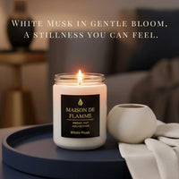Thumbnail for Lifestyle image of White Musk scented candle on a soft cozy setup — warm clean musk aroma and relaxing ambience.