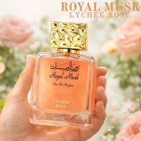 Thumbnail for Royal Musk Lychee Rose perfume by Surrati held in hand outdoors, fresh fruity floral Arabian fragrance  - Shopeezy